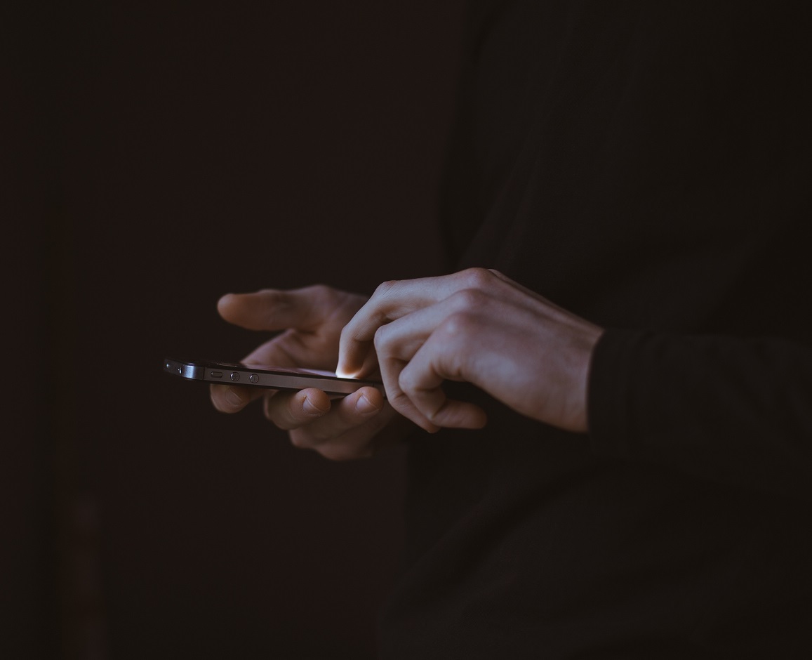 man on mobile phone leveraging digital technology